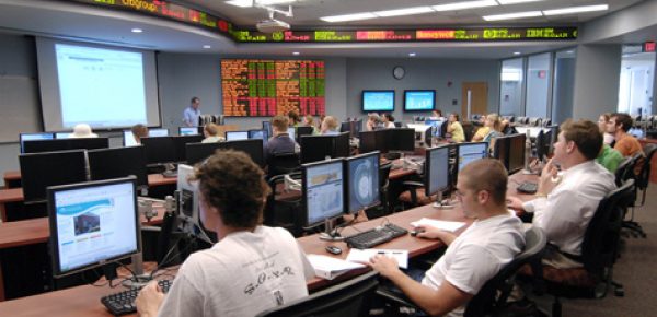 Students take in a lecture at the Computer Information Systems (CIS) Building's real-time electronic trading room at UNC Wilmington. - UNCW/Jamie Moncrief