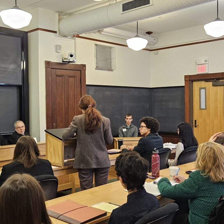 a view of a courtroom with students playing all the roles