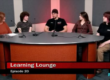four students sit with one adult at a round table